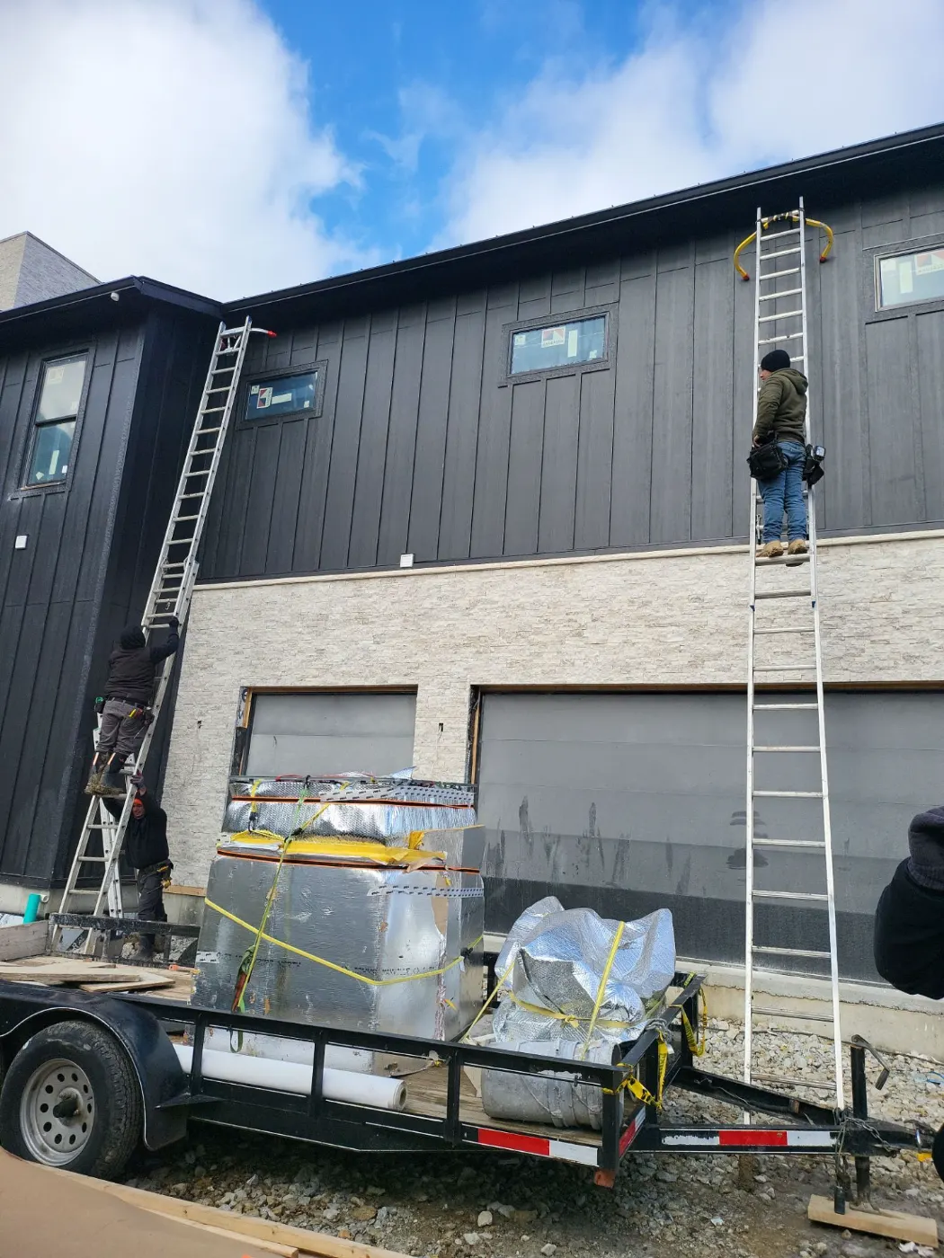 Siding installation documented in Innisbrooke